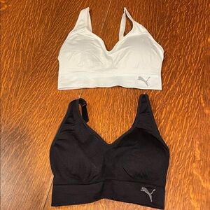 Two Puma Women's Black and White Sports Bras with Gray Logo